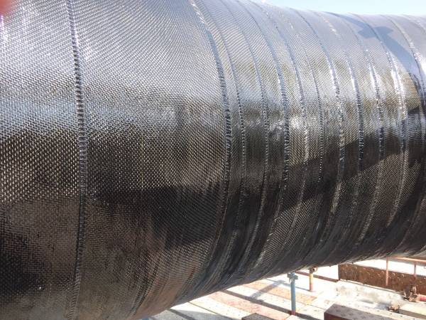 Fiberglass cloth is used to extend the service life of the corroded flare line.