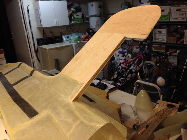 The model airplane is reinforced with fiberglass cloth.