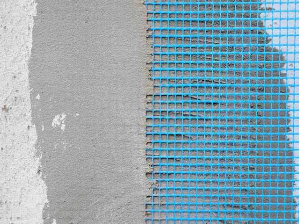 Blue fiberglass mesh is used for wall plastering.